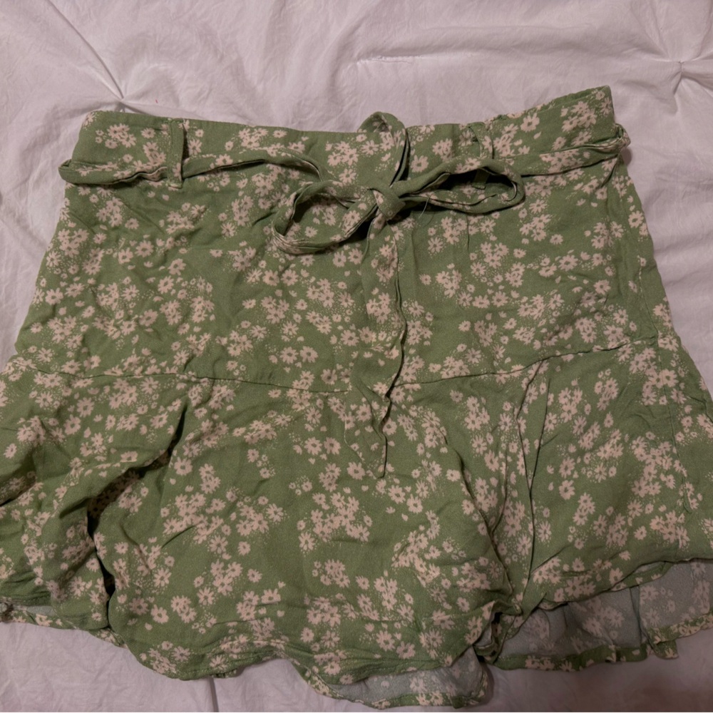 Green with white flowers skirt.